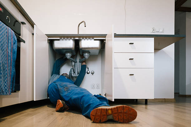 Professional Drain Cleaning technician working in Brenham, TX